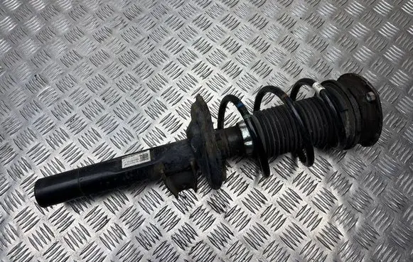 Volkswagen Golf VII Front shock absorber with coil spring 5QD411105D 5Q0413023GQ