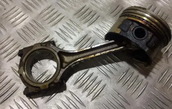 Piston with connecting rod