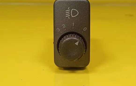 Headlight level height control switch