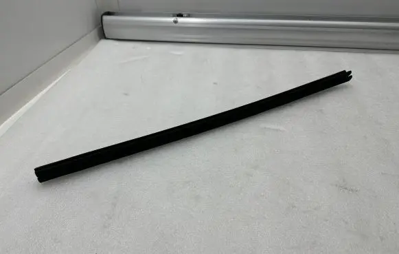 Tesla Model S Front door glass trim molding 6009597