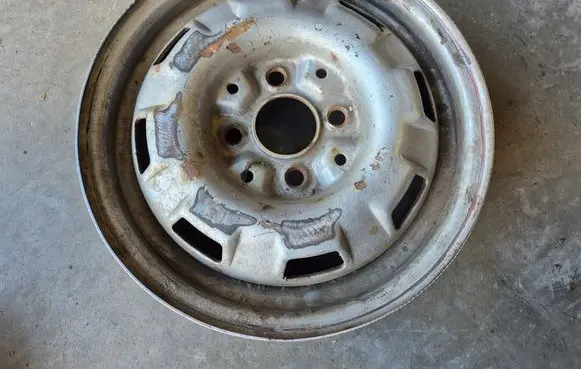 Volkswagen Golf I R13 steel rim 321601025A
