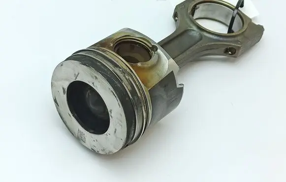 Piston with connecting rod