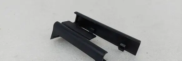 Front passenger seat rail trim