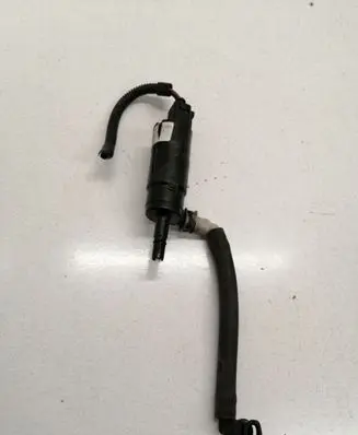 Volkswagen Golf IV Headlight washer pump 1J0955681