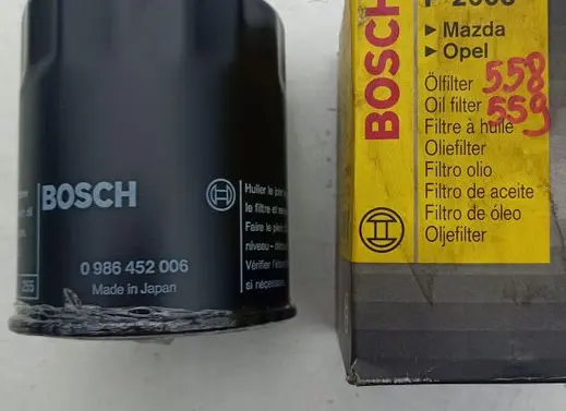 Mazda 626 Oil filter mounting bracket 0986452006