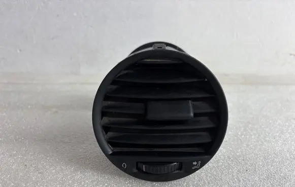 Volkswagen Caddy Dash center air vent grill 2K0819703B