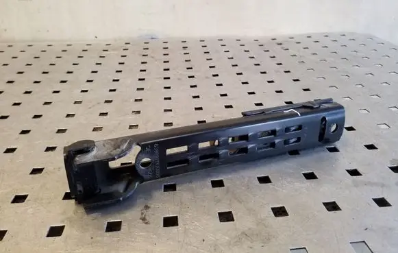 Volkswagen Golf VI Seat belt adjustment rail 1T0857819B