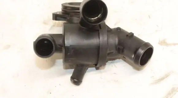 Thermostat/thermostat housing
