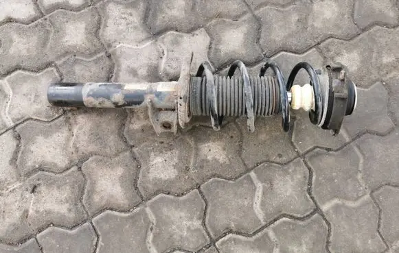 Volkswagen Golf VI Front shock absorber with coil spring 1K0413031BH
