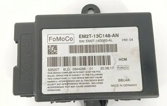 Volkswagen Touareg I Light module LCM EM2T13C148AN