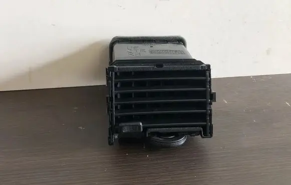 Nissan Leaf I (ZE0) Dash center air vent grill 687503NL0A N8666