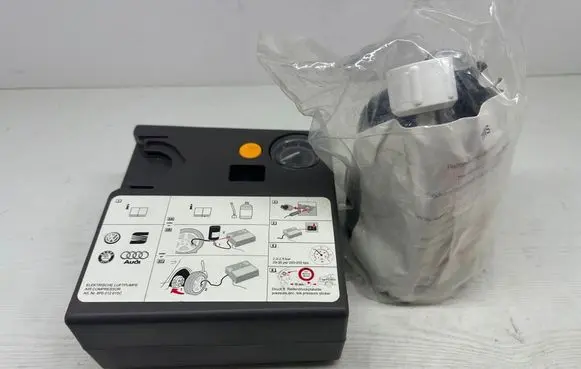 Volkswagen PASSAT B6 Tire air pump compressor 8P0012615C