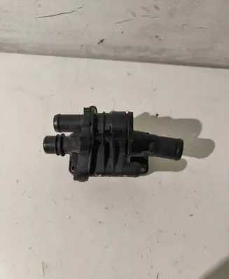 Thermostat/thermostat housing