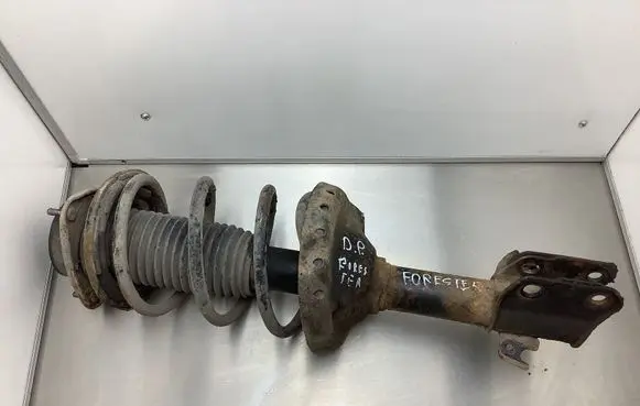Subaru Forester SG Front shock absorber with coil spring 