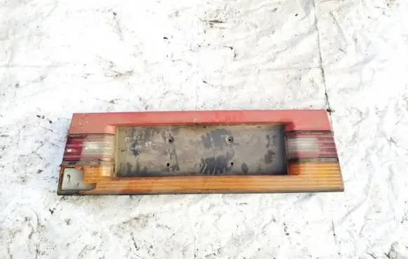 Mazda 626 Trunk door license plate light bar 