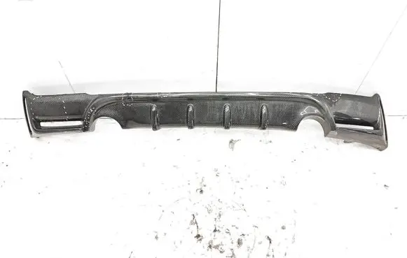 Rear bumper trim bar molding