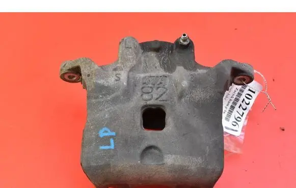 Nissan Juke I F15 Front brake caliper