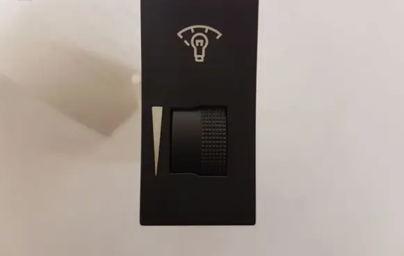 Panel lighting control switch