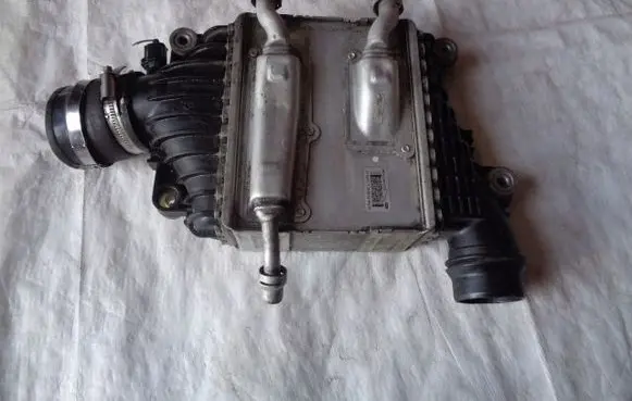 Jaguar XE Intercooler radiator GX736K775AB