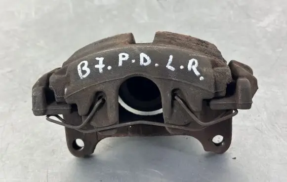 Volkswagen PASSAT B7 Front brake caliper 1K0615124
