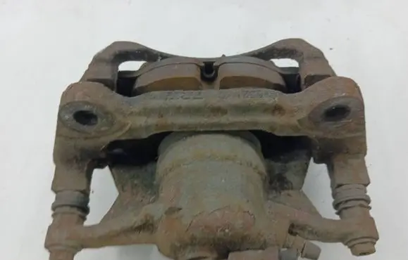 Volkswagen Golf VII Front brake caliper