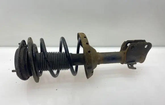 Subaru Legacy Front shock absorber with coil spring