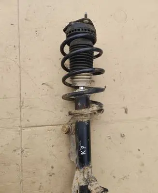 Ford Fiesta Front shock absorber with coil spring 04771901 Dsb198g