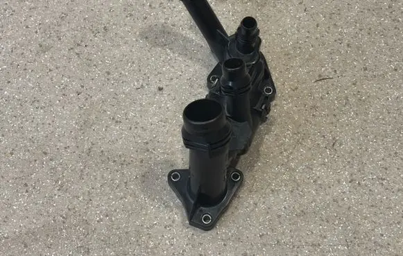 Thermostat/thermostat housing