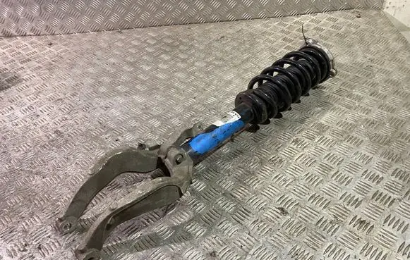 Front shock absorber with coil spring