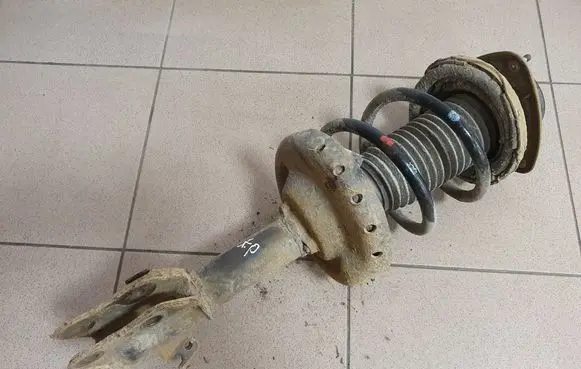 Subaru Forester SH Front shock absorber with coil spring