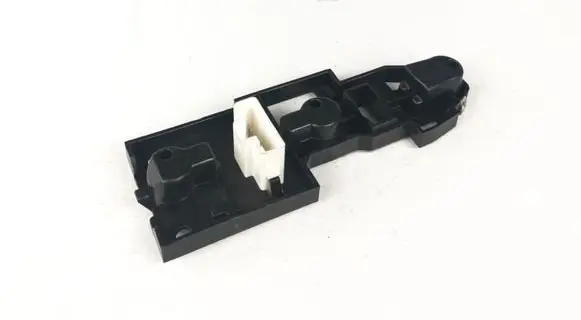 Tail light bulb cover holder