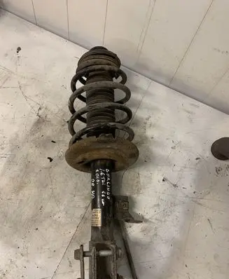 Citroen Berlingo Front shock absorber with coil spring