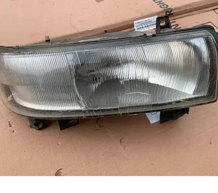 Renault Master II Headlight/headlamp 7700352104