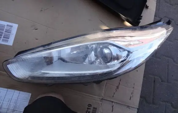 Ford Fiesta Headlight/headlamp C1BB-13W030-CG