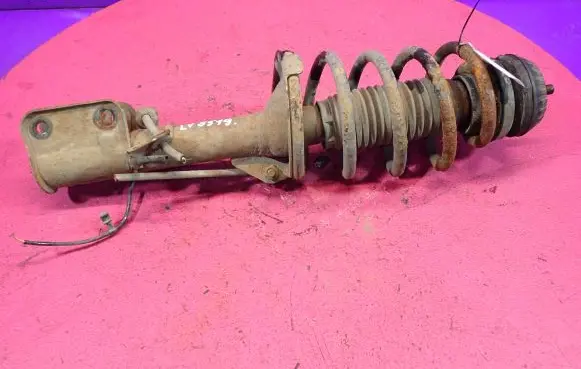 Front shock absorber with coil spring