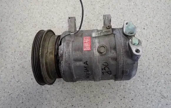 Nissan Maxima Air conditioning (A/C) compressor (pump) 926007E065