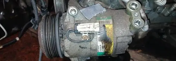 Opel Astra H Air conditioning (A/C) compressor (pump) 13124752