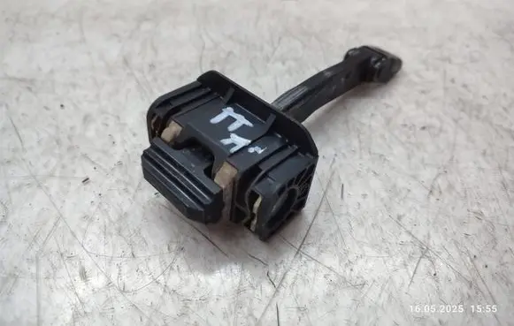 Front door check strap stopper