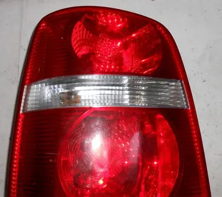Volkswagen Touran I Rear/tail lights 1T0945095F 1T0245711B
