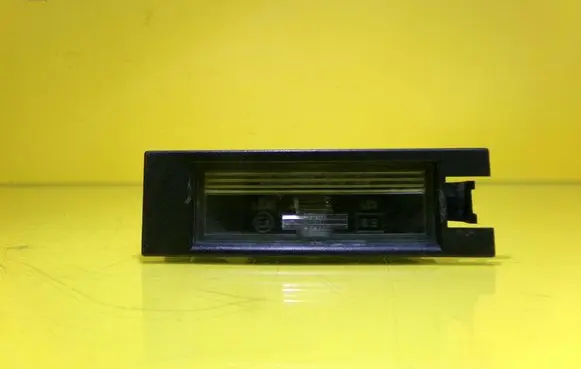 Opel Corsa C Number plate light 09184143 0461200