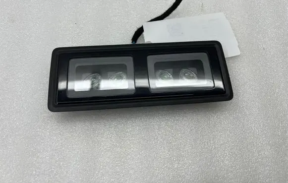 Headlining lighting console trim