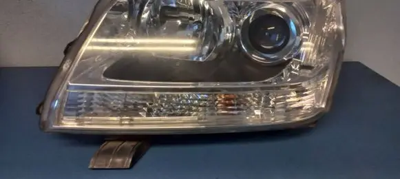 Suzuki Grand Vitara II Headlight/headlamp 10059088