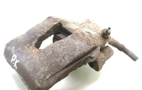 Volkswagen Golf VI Front brake caliper