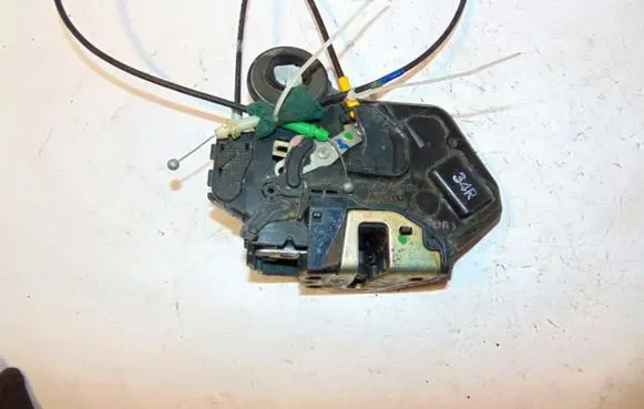 Toyota Camry Rear door lock 69050AA020