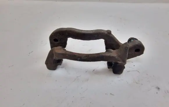 Nissan Qashqai Brake caliper pad carrier rear 0906A
