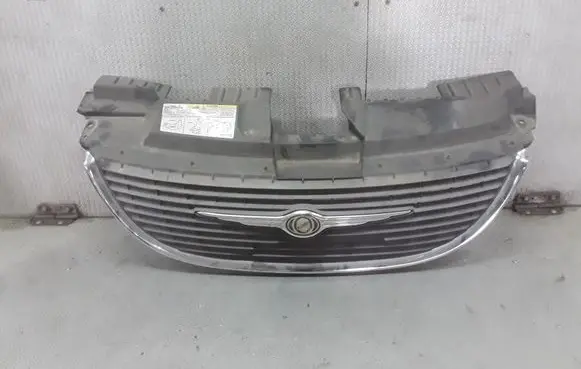 Chrysler Voyager Front bumper upper radiator grill 4857522A