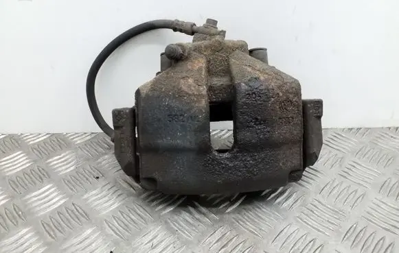 Volkswagen Golf VI Front brake caliper