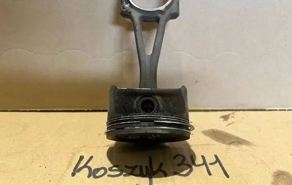 Opel Tigra B Piston with connecting rod 73L82A2