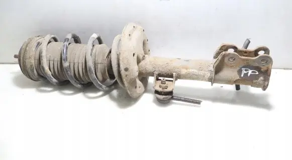 Opel Corsa D Front shock absorber with coil spring