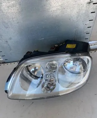 Volkswagen Touran I Headlight/headlamp 1T0941005R 0301205203